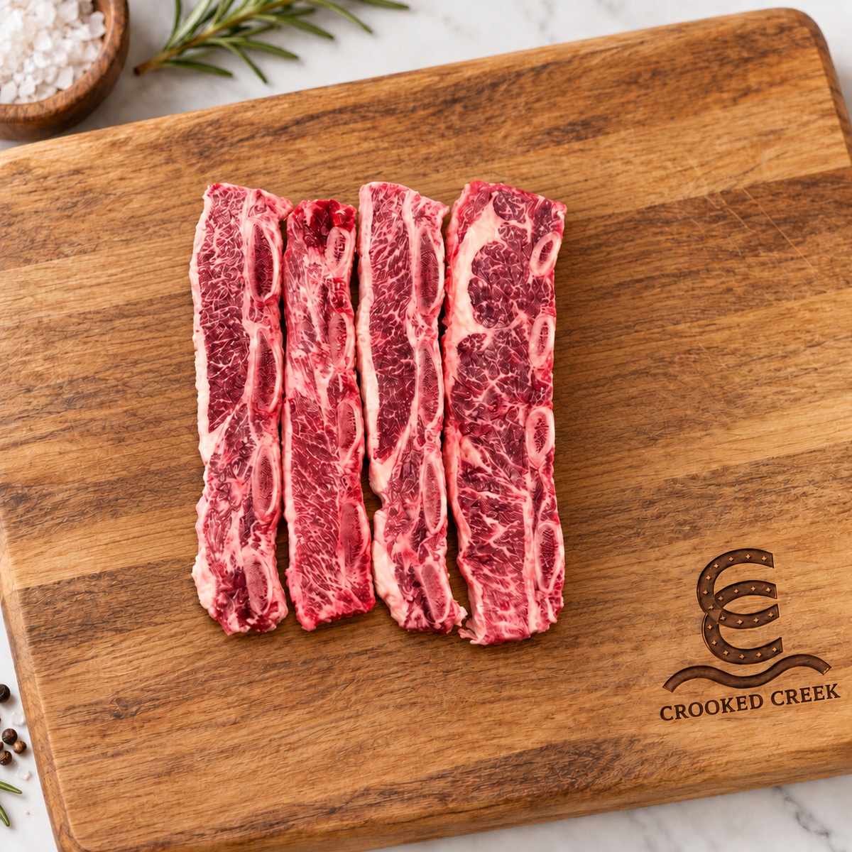 The Crosscut flanken-style Akaushi short ribs grouped on a Crooked Creek cutting board