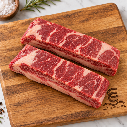 The Smokehouse Akaushi chuck short ribs on a Crooked Creek cutting board